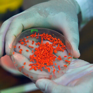 Quality control testing of orange plastic pellets in a lab setting